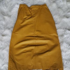 SOLD Mustard colored 💯 leather skirt.